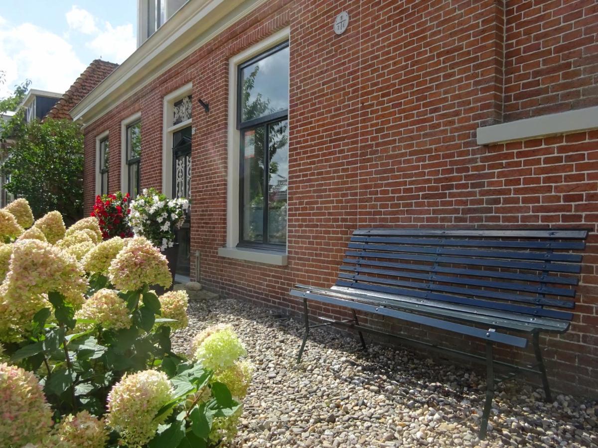 D' Ald Skoalle - Sfeervol Appartement In Oude School. Wijtgaard Bagian luar foto
